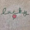 St. Patrick’s Day Cursive Lucky Embroidered Graphic Sweatshirt
