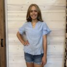 Solid V Neck Ruffle Hem Loose Fit Blouse